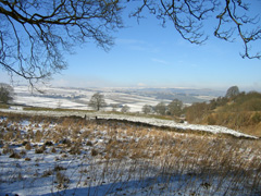 View north across snowy fields from Windmill - Great Hucklow road 