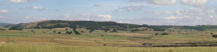 Picture of Hucklow Edge escarpment, under which the villages nestle